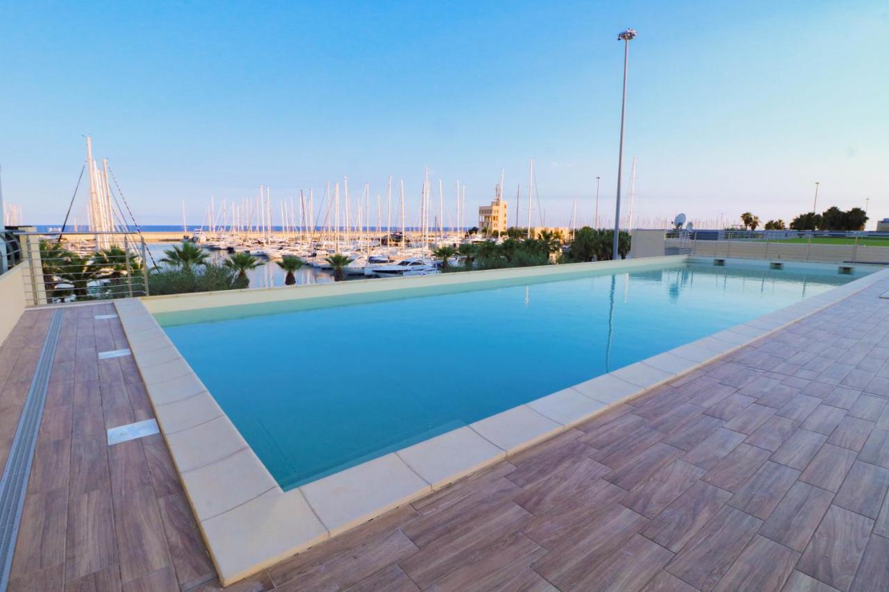 Appartement H11 Luxury 9A - Porto - Piscina - Jacuzzi à Santo Stefano al Mare Extérieur photo