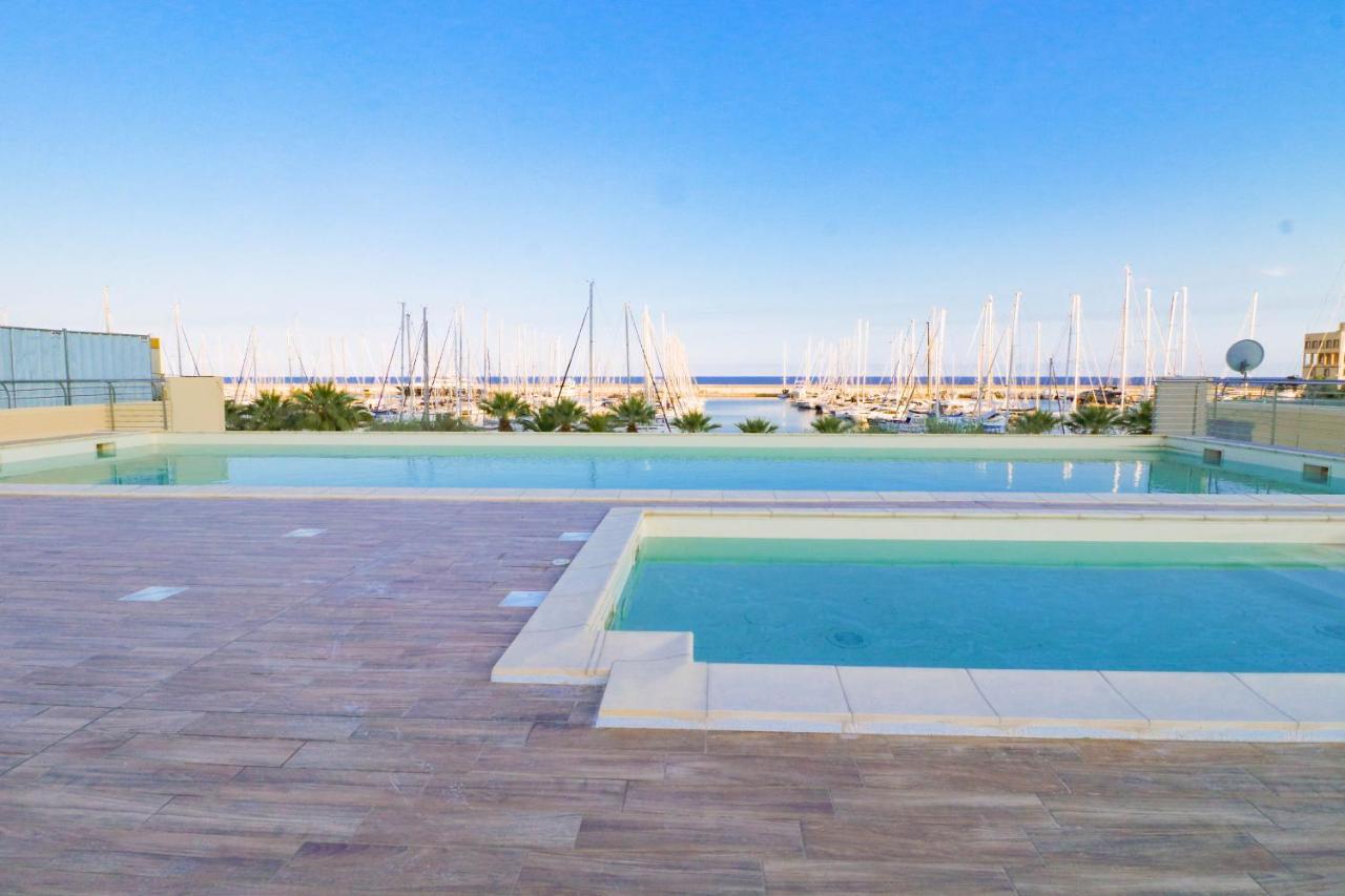 Appartement H11 Luxury 9A - Porto - Piscina - Jacuzzi à Santo Stefano al Mare Extérieur photo